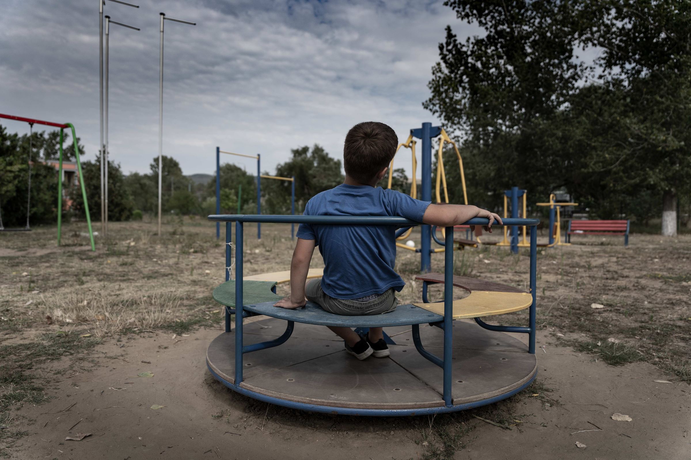 Junge auf einem Karussell auf dem Projektspielplatz in Nisporeni/Moldau (Quelle: Christian Nusch) Junge auf einem Karussell auf dem Projektspielplatz in Nisporeni/Moldau (Quelle: Christian Nusch)
