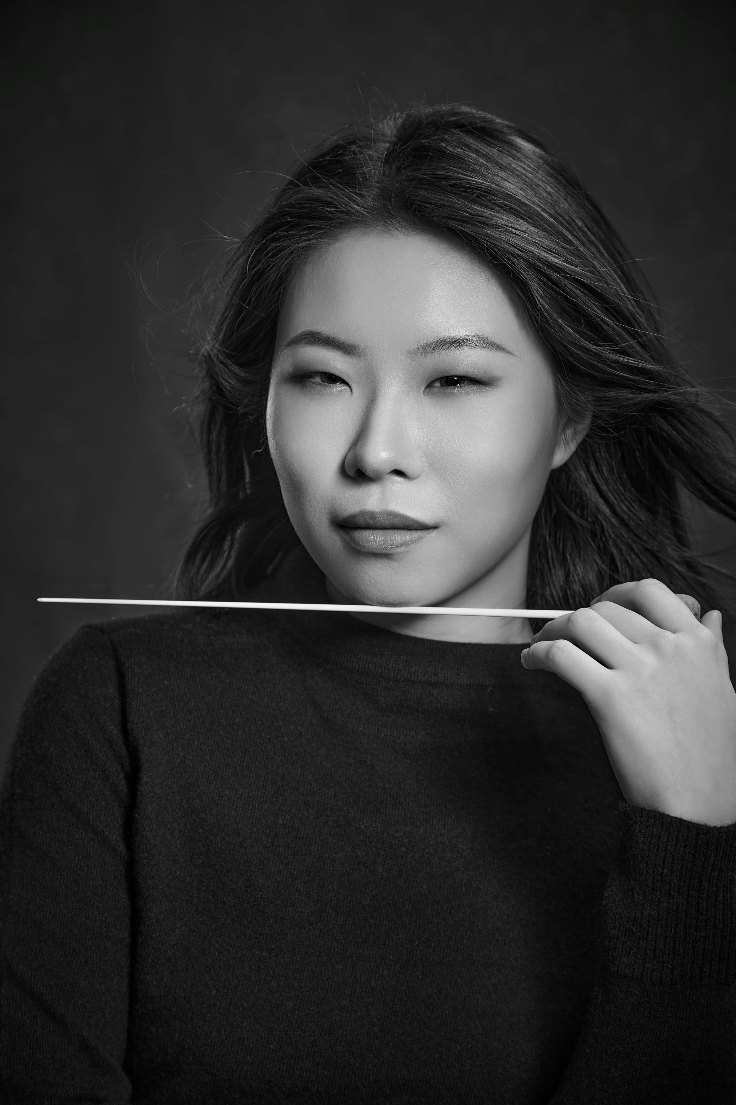 Acclaimed guitarist and orchestral conductor Ying Xu. (Photo: Haima Master Studio) Acclaimed guitarist and orchestral conductor Ying Xu. (Photo: Haima Master Studio)